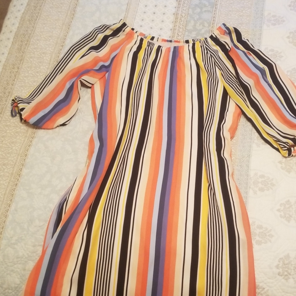 Off the shoulder multi color dress.